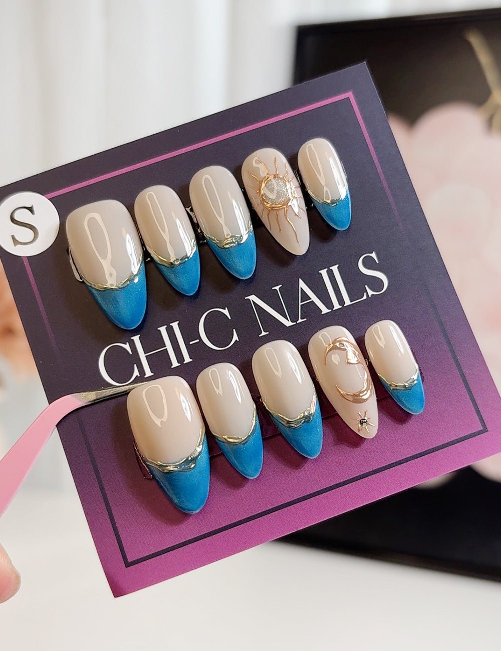 Solar Coast – Blue French Tip Press-On Nails with Sun Charm (Medium Almond)