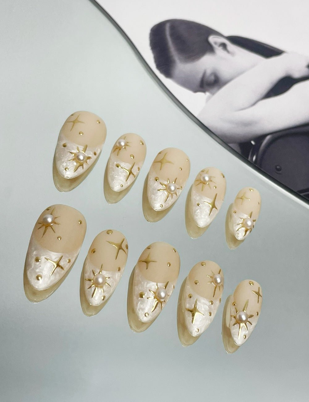 Starlit Pearl Press-On Nails – Milky Nude & Gold Star Design