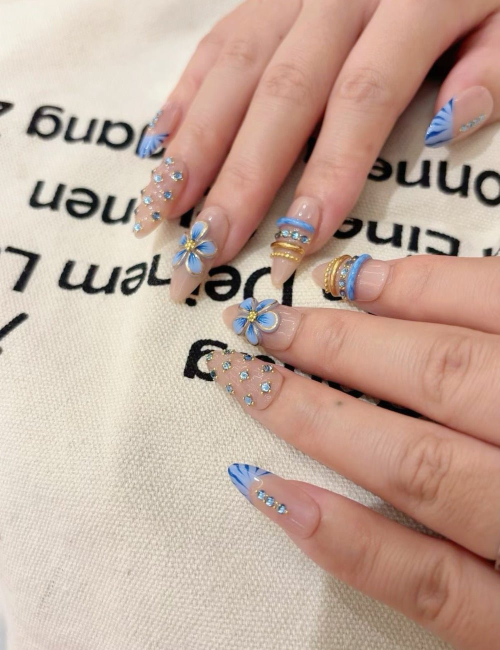 Blue Blossom French Press-On Nails | Nude Floral Almond Nail Set