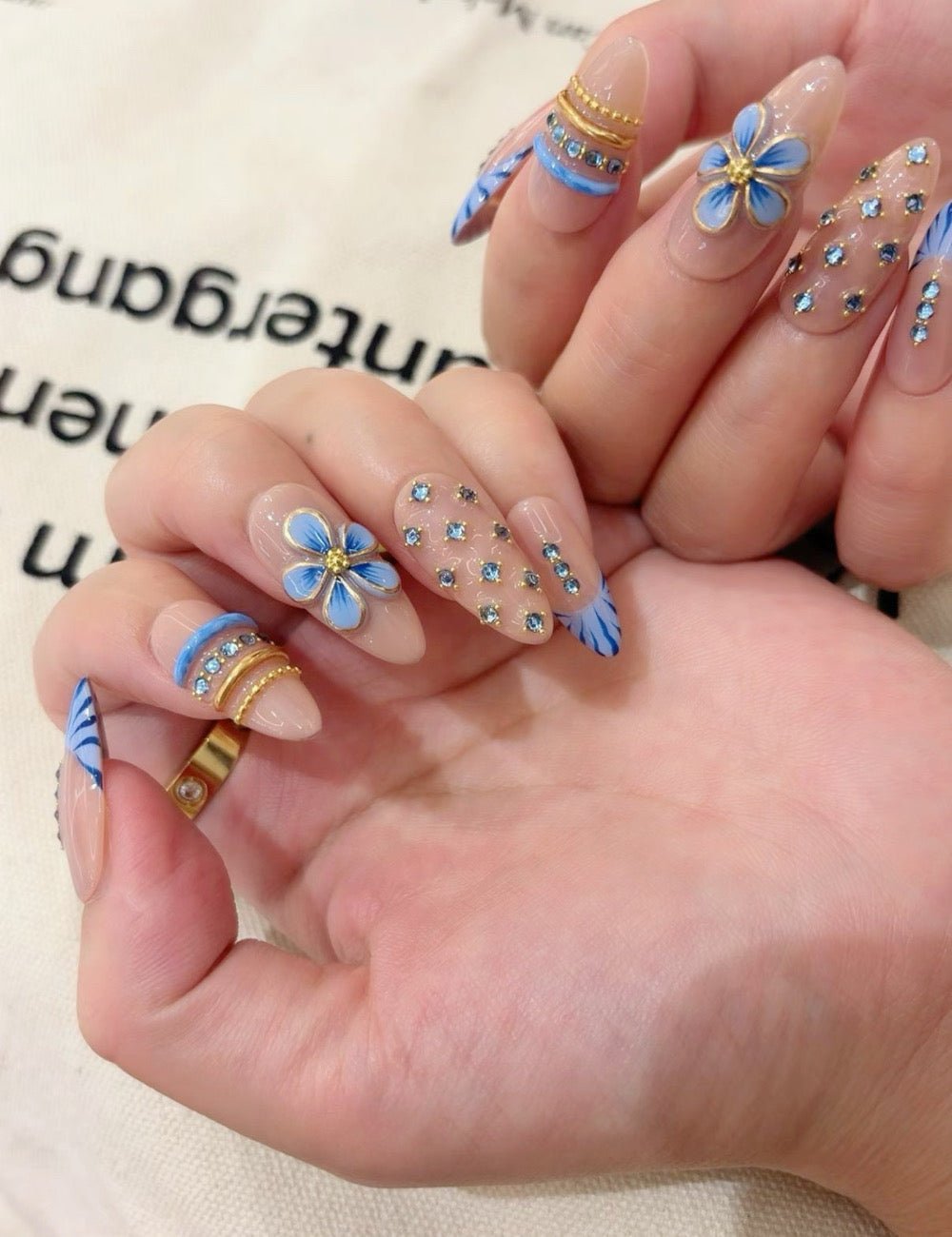 Blue Blossom French Press-On Nails | Nude Floral Almond Nail Set