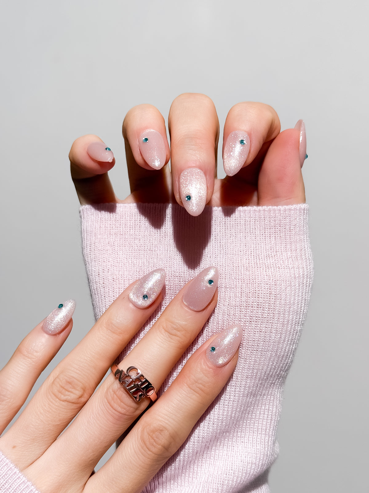 Aqua Spark Short Almond Press On Nails