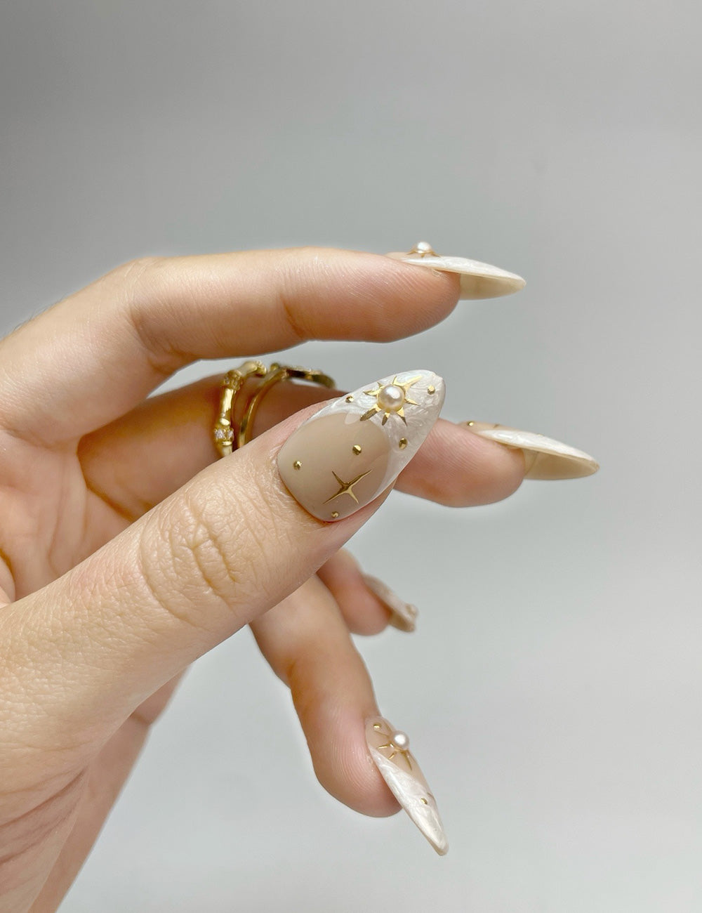 Starlit Pearl Press-On Nails – Milky Nude & Gold Star Design